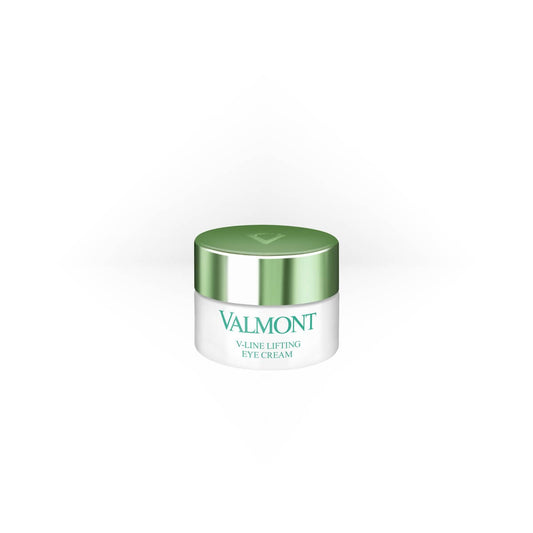Valmont V-Line Lifting Eye Cream in a white jar with a light green metallic lid, designed for targeted anti-aging around the eyes.