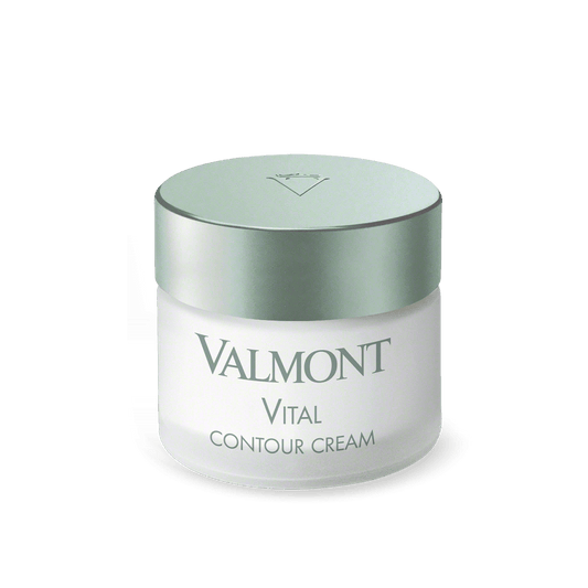 A white jar of Vital Contour Cream with a silver lid features the product name in gray text on the front and provides a revitalizing formula for anti-aging eye care and reducing dark circles.