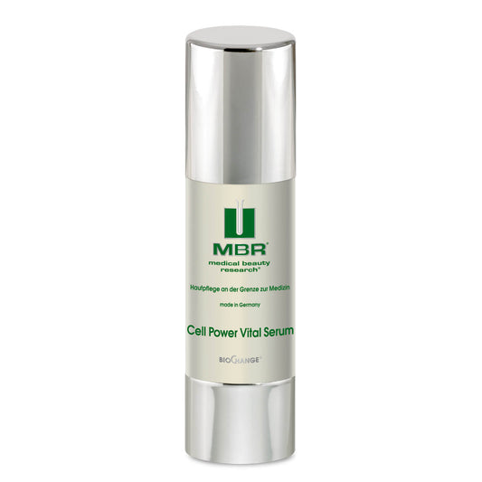 A silver and white bottle of Cell Power Vital Serum with a green logo stands upright on a plain white background, emphasizing its focus on cell renewal and enhanced epidermal cell activity.