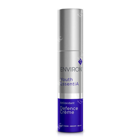 A silver and blue bottle of Antioxidant Defence Crème, an anti-aging moisturizer with a pump dispenser and clear front label text.