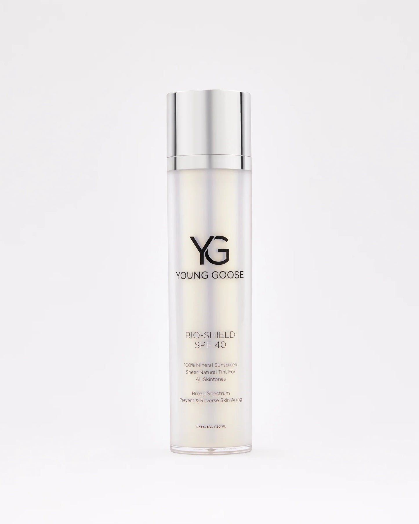 A bottle of Bio-Shield SPF 40 mineral sunscreen, featuring a silver cap and white gradient label with black text, stands upright against a plain white background for superior blue light defense.