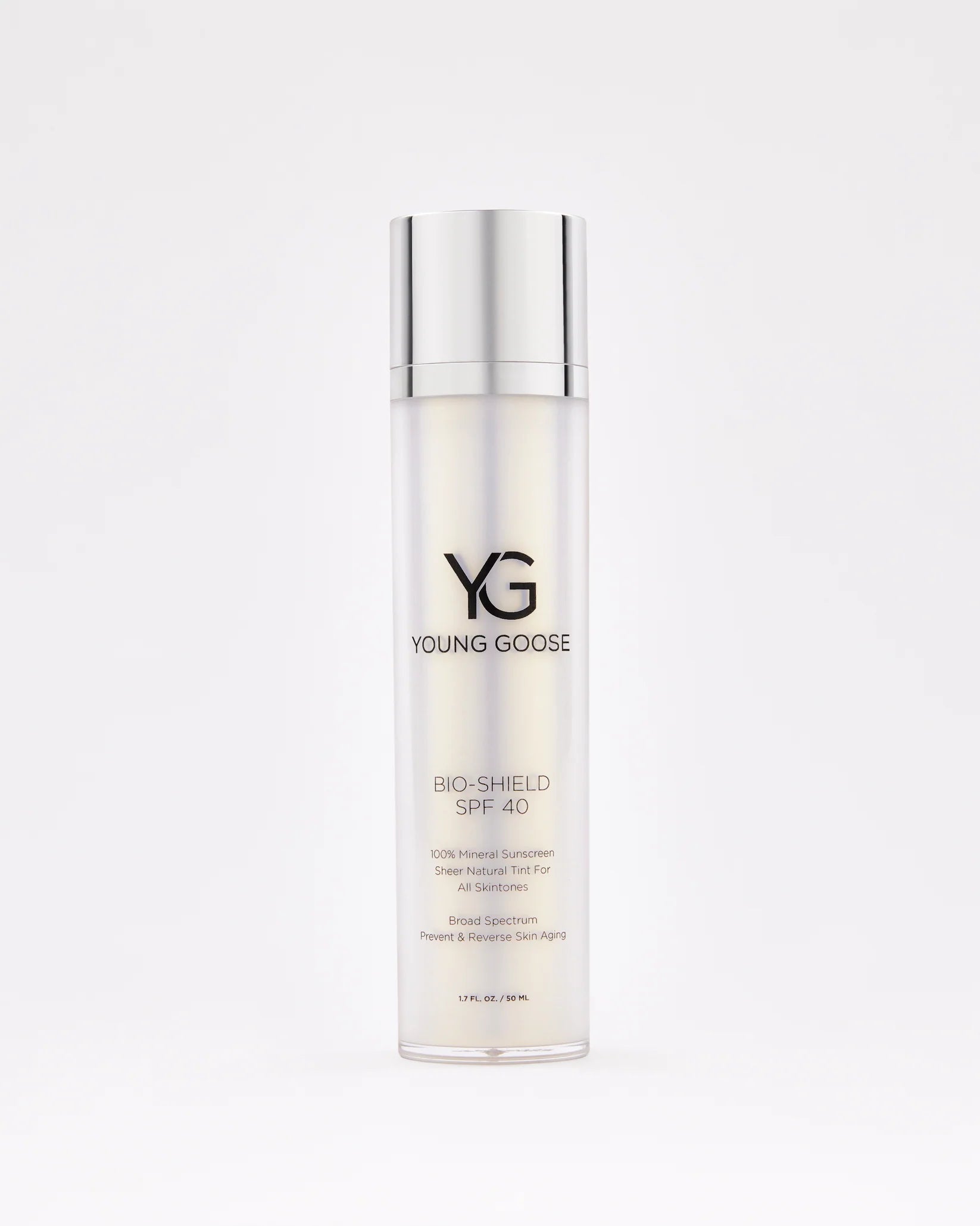 A bottle of Bio-Shield SPF 40 mineral sunscreen, featuring a silver cap and white gradient label with black text, stands upright against a plain white background for superior blue light defense.