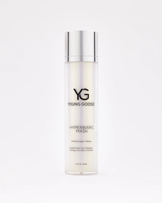 A tall cylindrical bottle of Hyperbaric Mask with a silver cap, clear body, and minimalistic black text label stands upright against a plain white background, highlighting its Oxygen Therapy benefits for instant hydration.