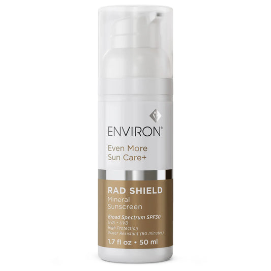 A white and gold pump bottle of RAD Shield Mineral Sunscreen, 1.7 fl oz (50 ml), SPF 30, offers broad-spectrum physical UV protection and 80 minutes water resistance.
