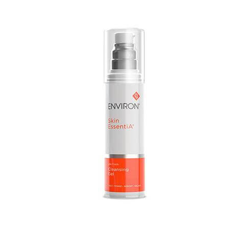A bottle of Low Foam Cleansing Gel with a pump dispenser, white and orange labeling, and a clear cap stands upright on a plain white background. This cleanser helps support skin moisture balance.