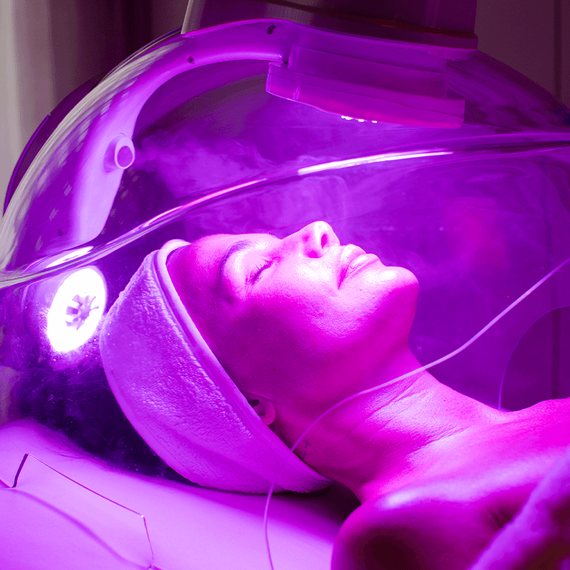 Treatments. Photo of women getting LED facial treatment.