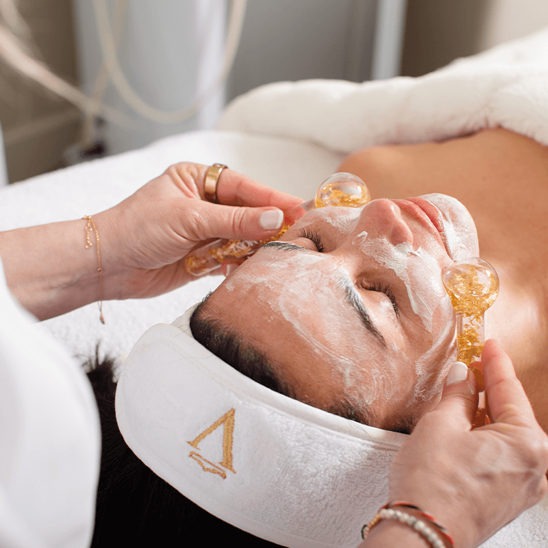 Valmont Facials. Image of women receiving a facial.