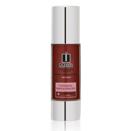 A cylindrical bottle of ContinueLine Protection Shield Rich moisturizing cream features a maroon label with silver accents and a white cap, displaying the brand logo and product details for advanced skin protection.