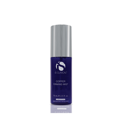 A blue and silver bottle of IS Clinical Copper Firming Mist, 75 ml (2.5 fl oz), provides skin hydration and antioxidant protection, displayed upright on a white background.