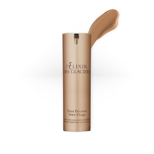 Elixir des Glaciers Teint Précieux in shade Sienna Tuscany, a luxurious foundation in a frosted glass bottle with a gold cap.