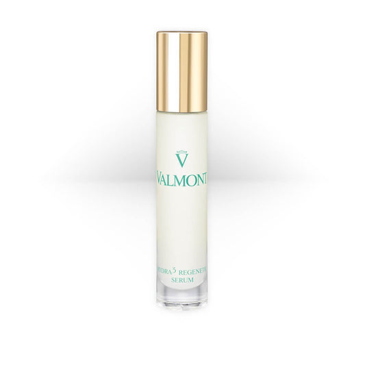 Valmont Hydra3 Regenetic Serum in a sleek white bottle with a silver cap and green logo text, an intensive hydrating serum designed to plump and regenerate dry skin.