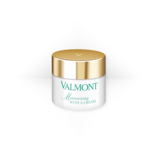 Valmont Moisturizing With a Cream in a white jar with a silver lid and green logo text, a hydrating face cream for daily moisture balance.