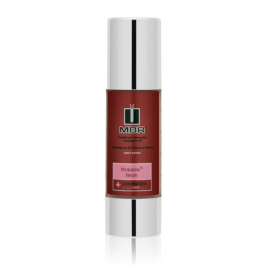 MBR Modukine™ Serum in a sleek silver pump bottle, a soothing and restorative serum designed to calm sensitive skin and strengthen the skin barrier.