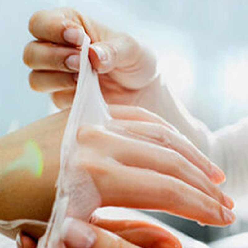 The advanced anti-ageing hand treatment.. Image of hand getting skin treatment.